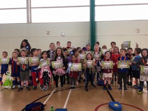 kids at camp getting certificates