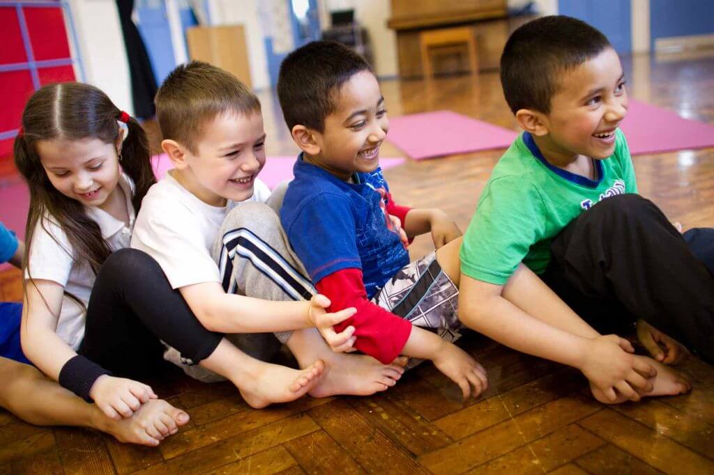 children having fun at a yogabugs session