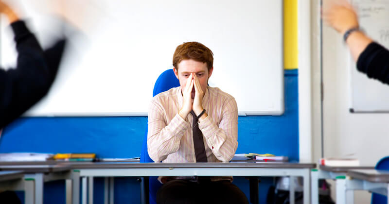 a stressed out looking teacher