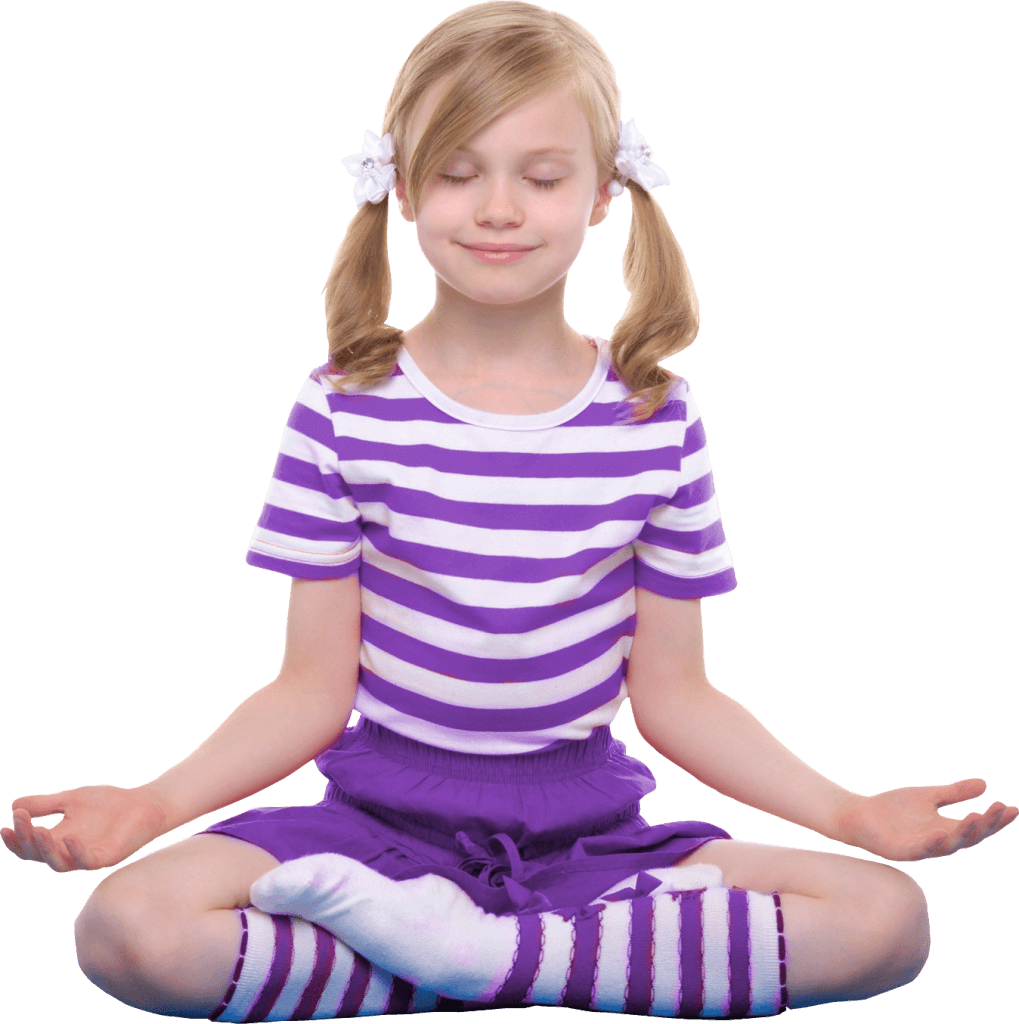 young girl sat crossed legged in a yoga pose smiling calmly