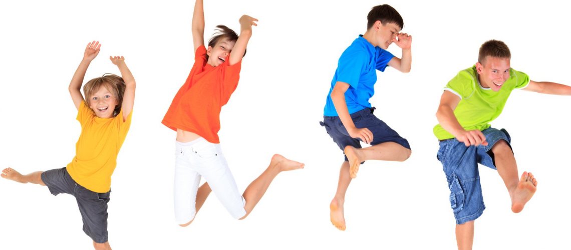 kids jumping in the air in brightly coloured clothes