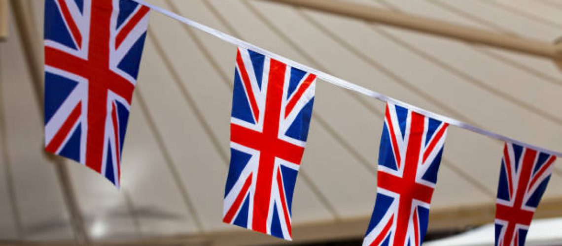 Red, white and blue british flag bunting to celebrate the VE Day.